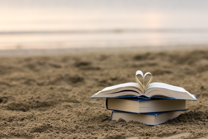 Books on the beach. I heart reading!